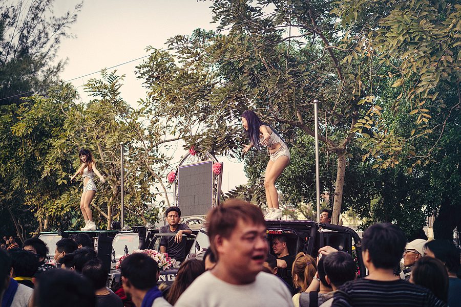 Yanhsui Fireworks Festival  - Young girls dancing on pickup trucks to entertain the god